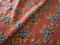 Preview: Musterwalk Winter 2025/26 Neu  Blumen auf orange Walkloden Italien