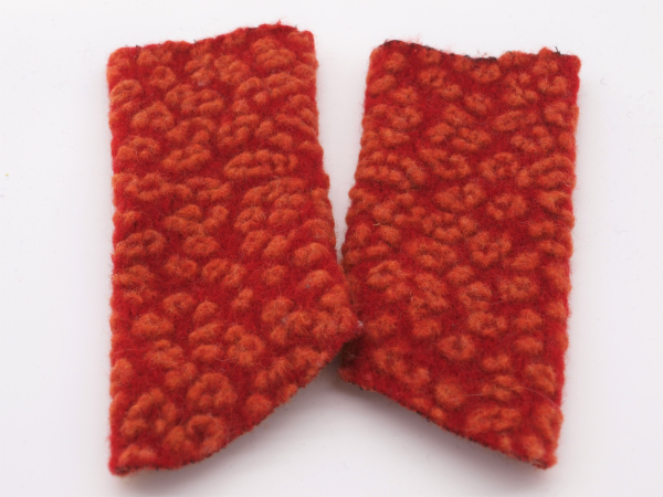 STULPEN KREISE ORANGE AUF ROT HANDGEFERTIGT